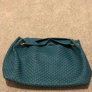 Teal purse 18” tall by 13” wide with gold hardware